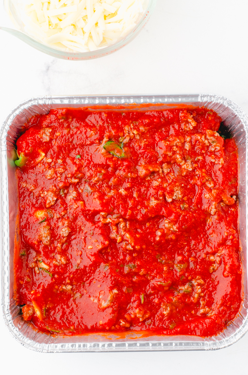 marinara sauce layer in a tortellini casserole