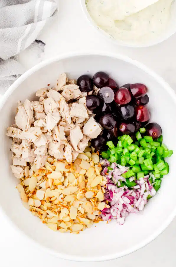Chicken salad ingredients in a bowl