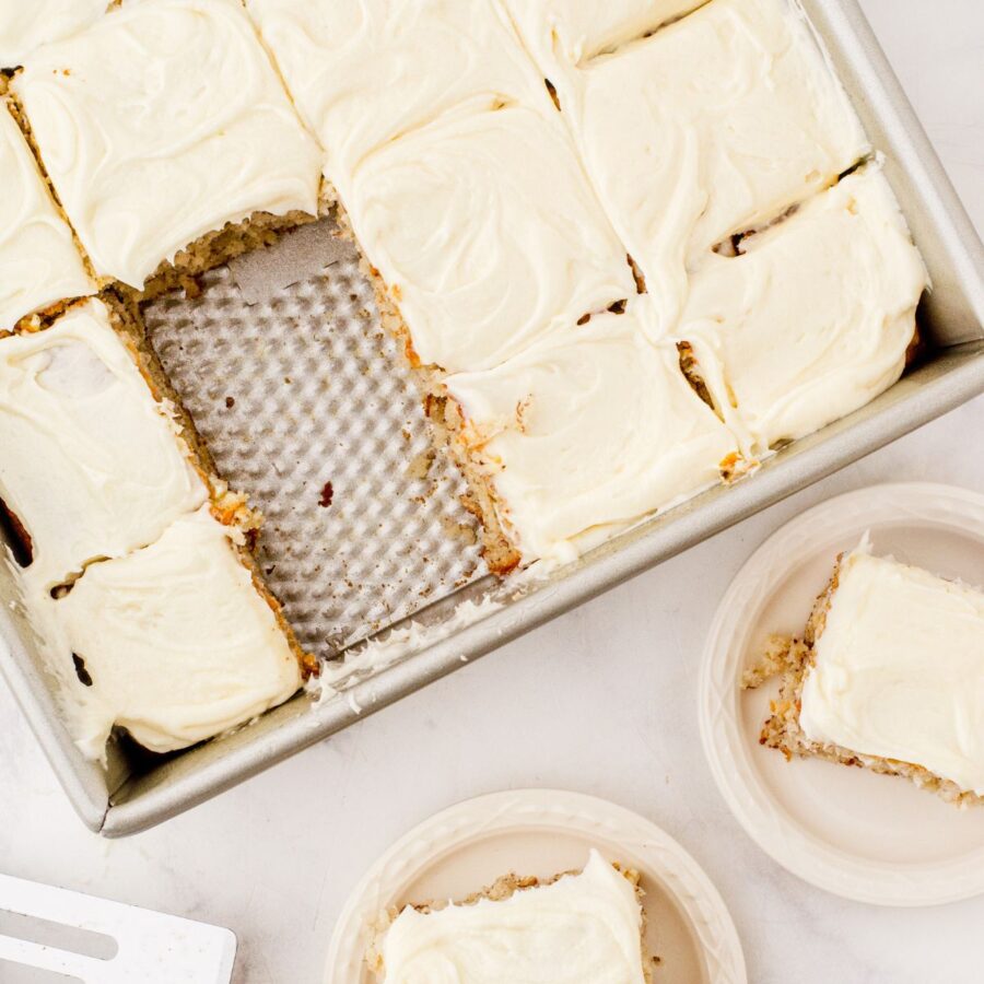 a pan of banana cake with two slices out of it