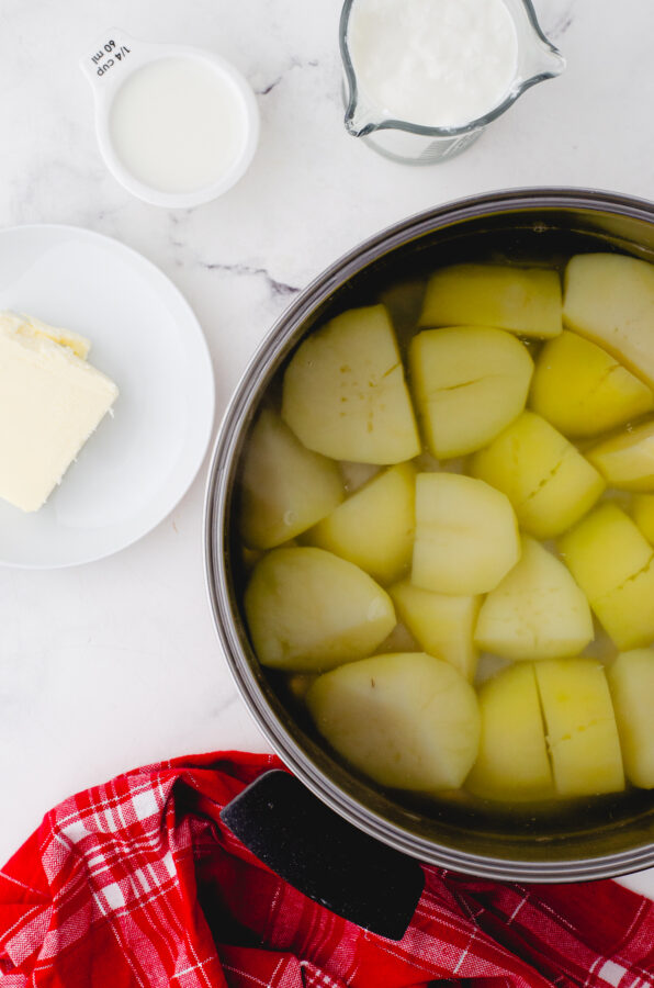 Cooked, boiled potatoes with all the add ins beside for mashed potatoes