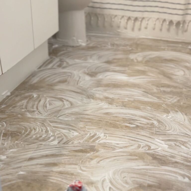 shaving cream smeared on bathroom floor