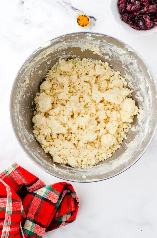 Whipped shortbread dough in a mixing bowl