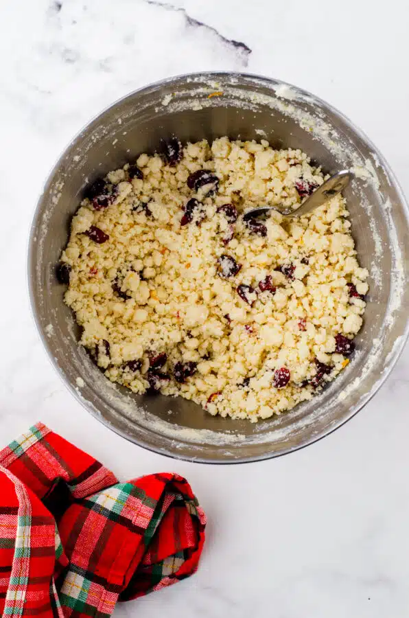 Cranberries & orange zest stirred into shortbread cookie dough.