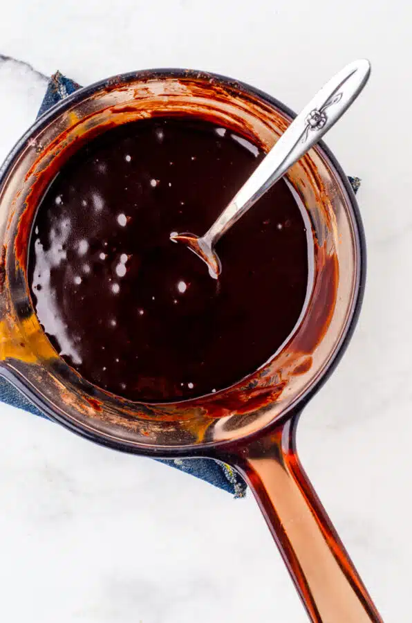 Melted base for nanaimo bars in a double boiler .