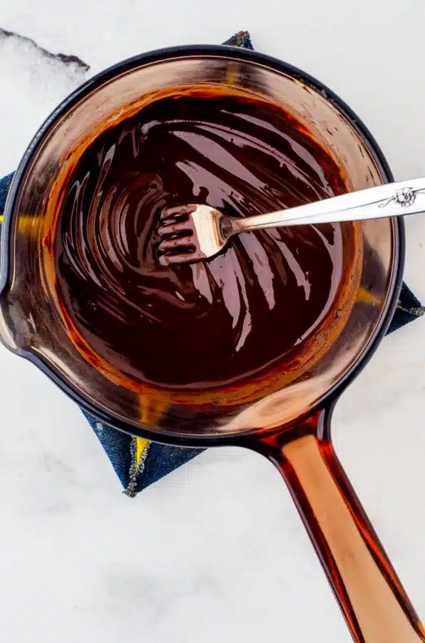 Melted chocolate for the top layer of nanaiamo bars