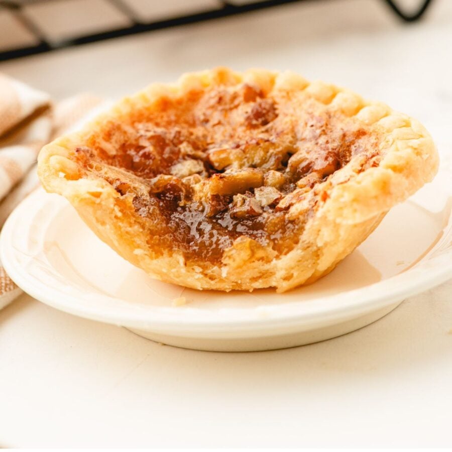 a butter tart with a bite out of it.